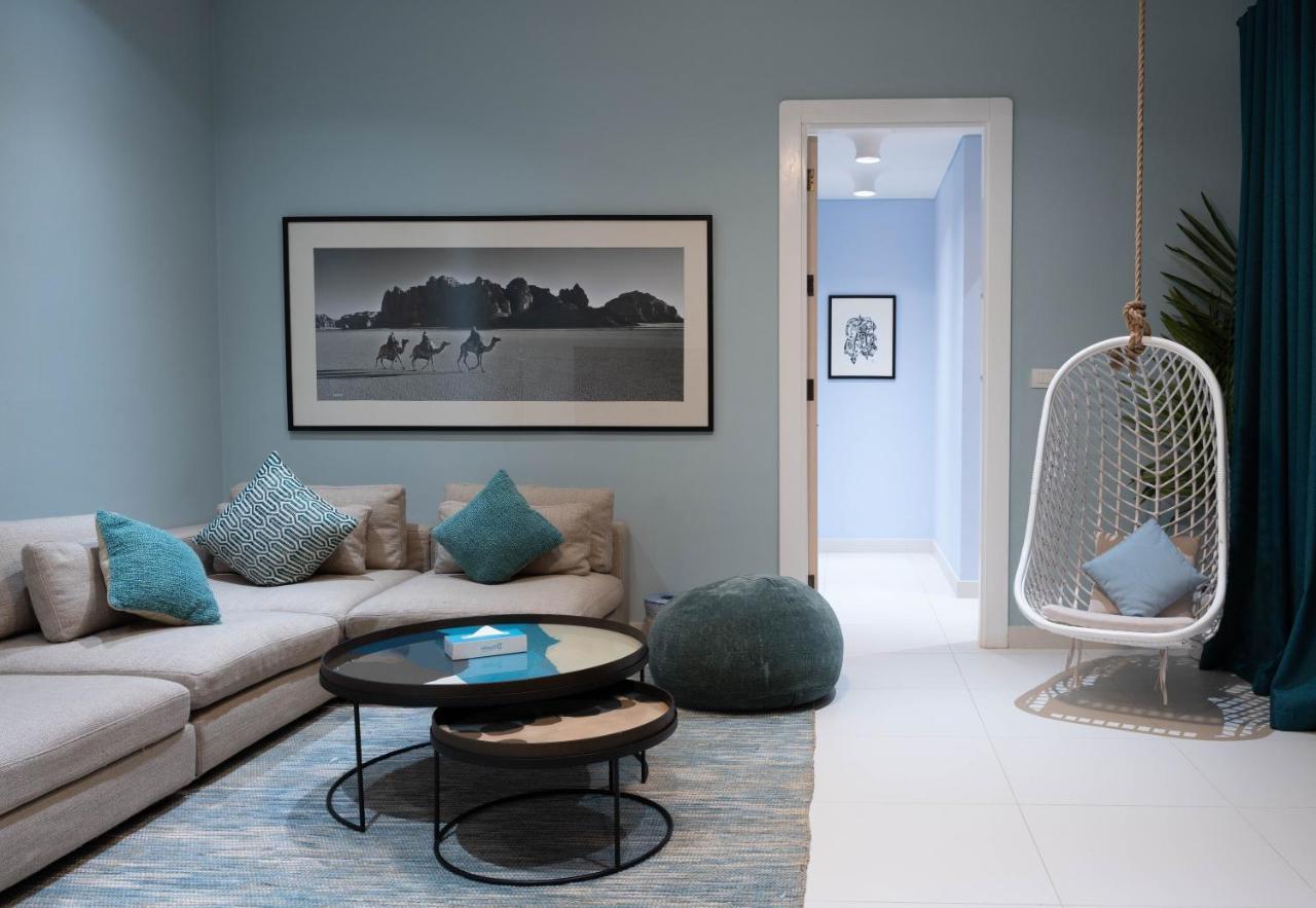 Cloud 7 Residences Ayla Άκαμπα Εξωτερικό φωτογραφία A living room with a swing chair